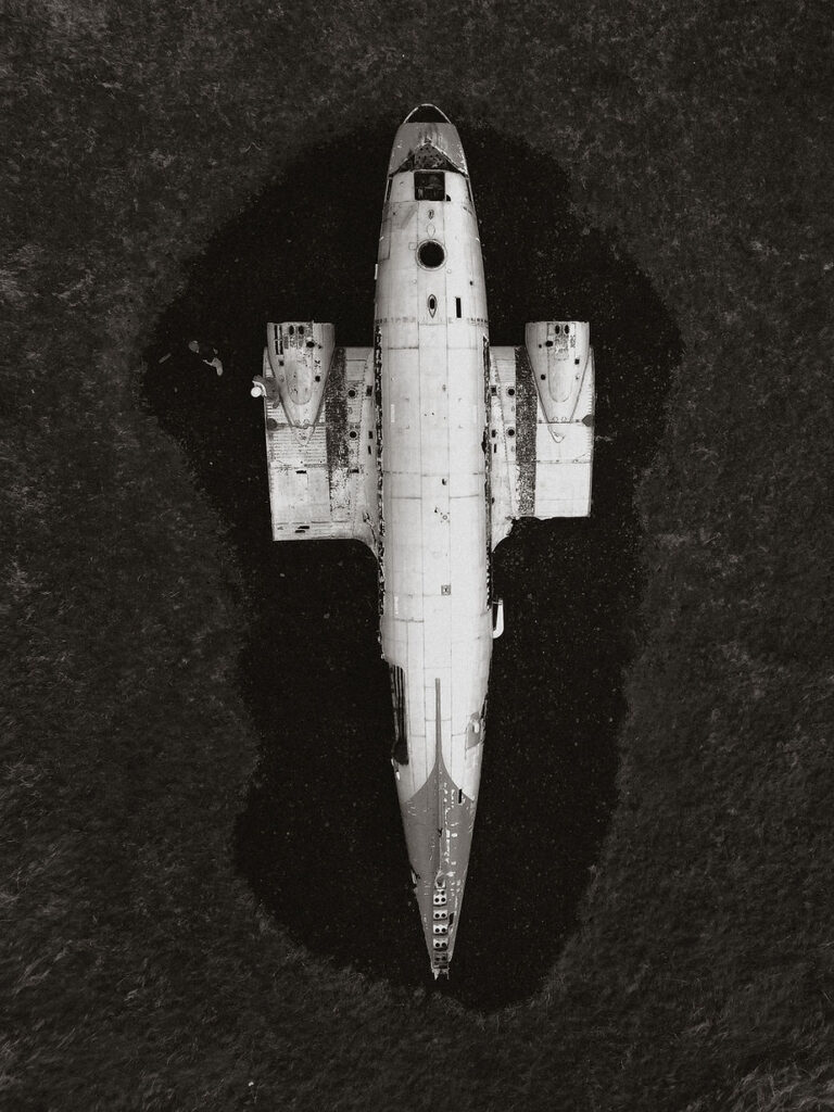 Eyvindarholt abandoned DC-3 plane in a remote valley, unique elopement photo location in Iceland.