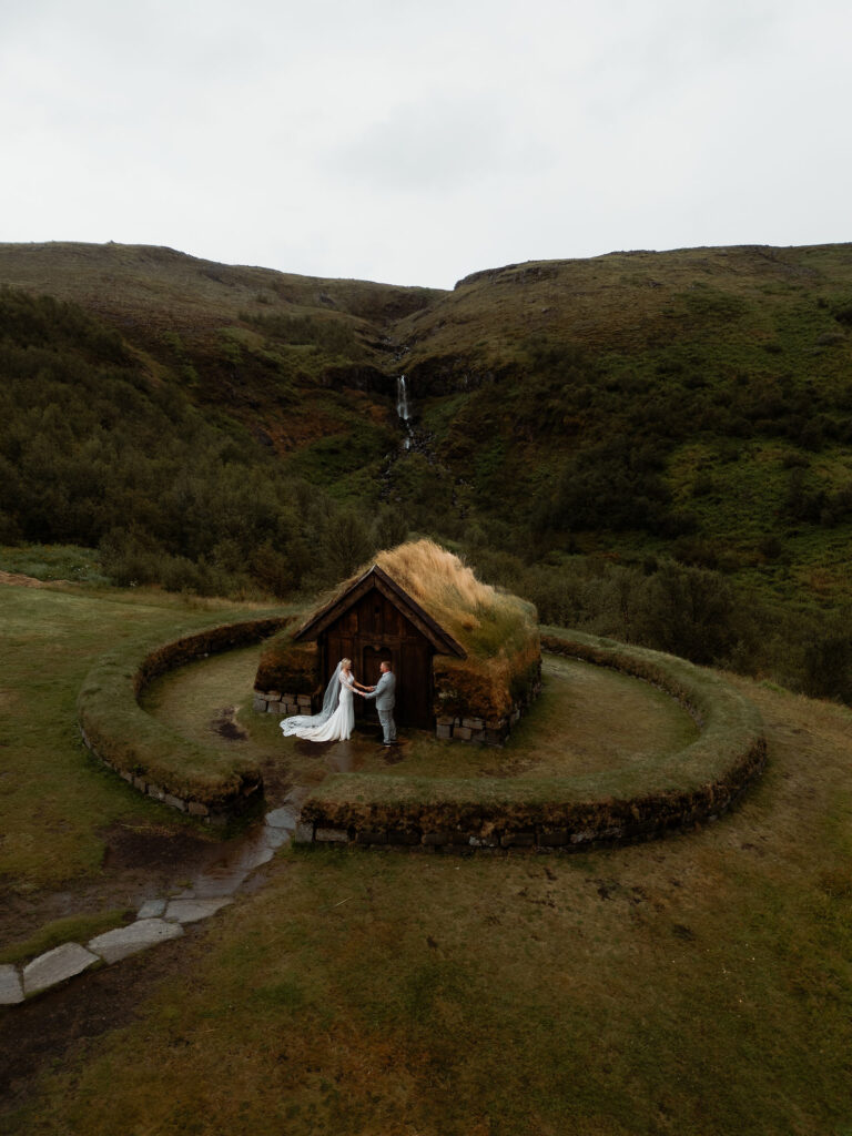 Bride and groom get married during their iceland elopement adventure.