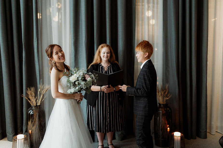 lgbtqi+ couple has a wedding ceremony in downtown reykjavik, iceland.